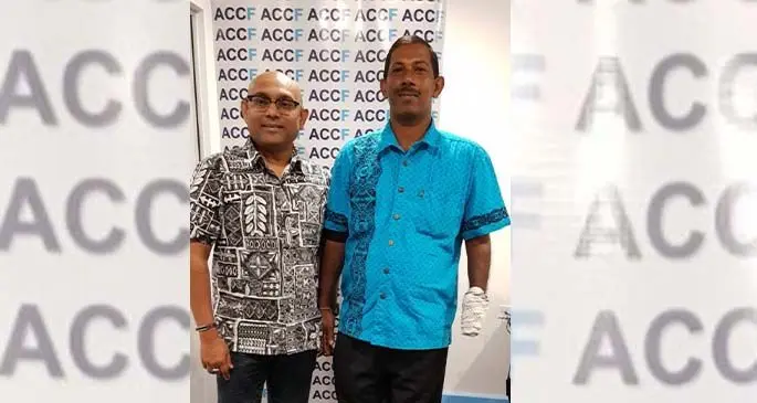 Accident Compensation Commission of Fiji chief executive officer Parvez Akbar (left) with Manoj Kumar.