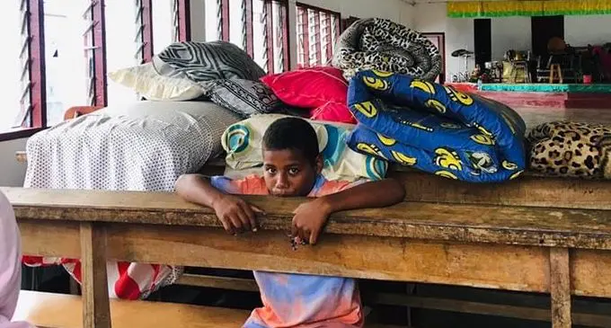 Villagers evacuated to the Assemblies of God Church in Savadrua.