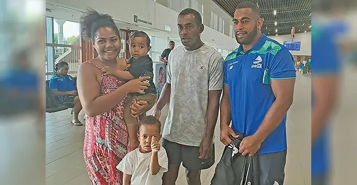 From left: Miriama Natave, carries baby daughter Arieta, son Bakewa, Sekove Natave with Swire Shipping Fijian Drua prop Livai Natave at Nadi International Airport on March 2, 2023. Photo: Waisea Nasokia