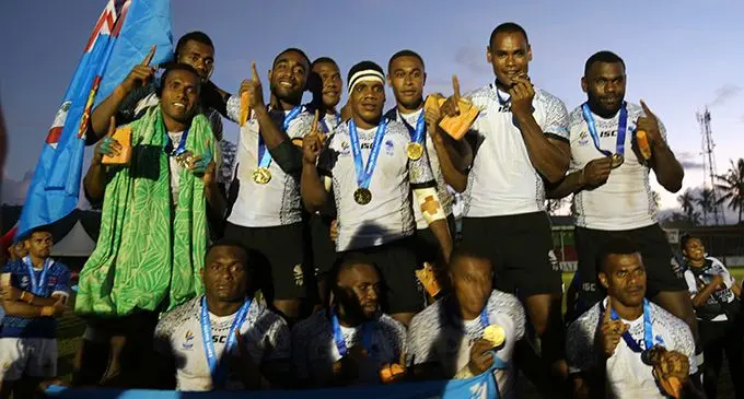 Team Fiji men’s 7s team captain Terio Tamani (standing first from left) with his team-mates after the Pacific Games medal presentation in Apia, Samoa on July 13, 2019. Photo: Anasilini Natoga