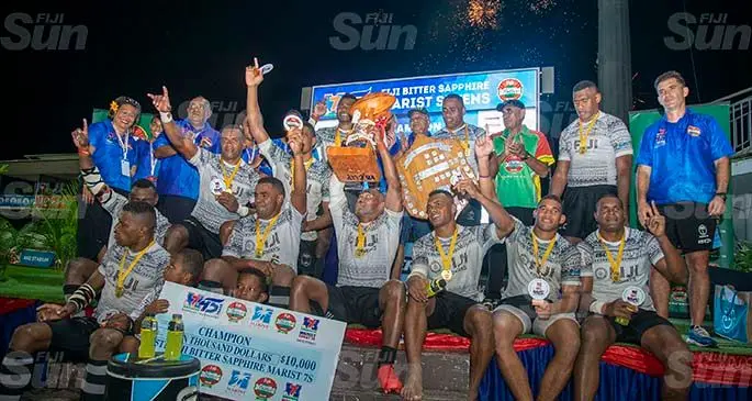 Fijian Shadow 7s players and officials celebrate their win at the Fiji Bitter Marist 7s Cup final at the ANZ Stadium, Suva on March 27, 2021. Photo: Leon Lord