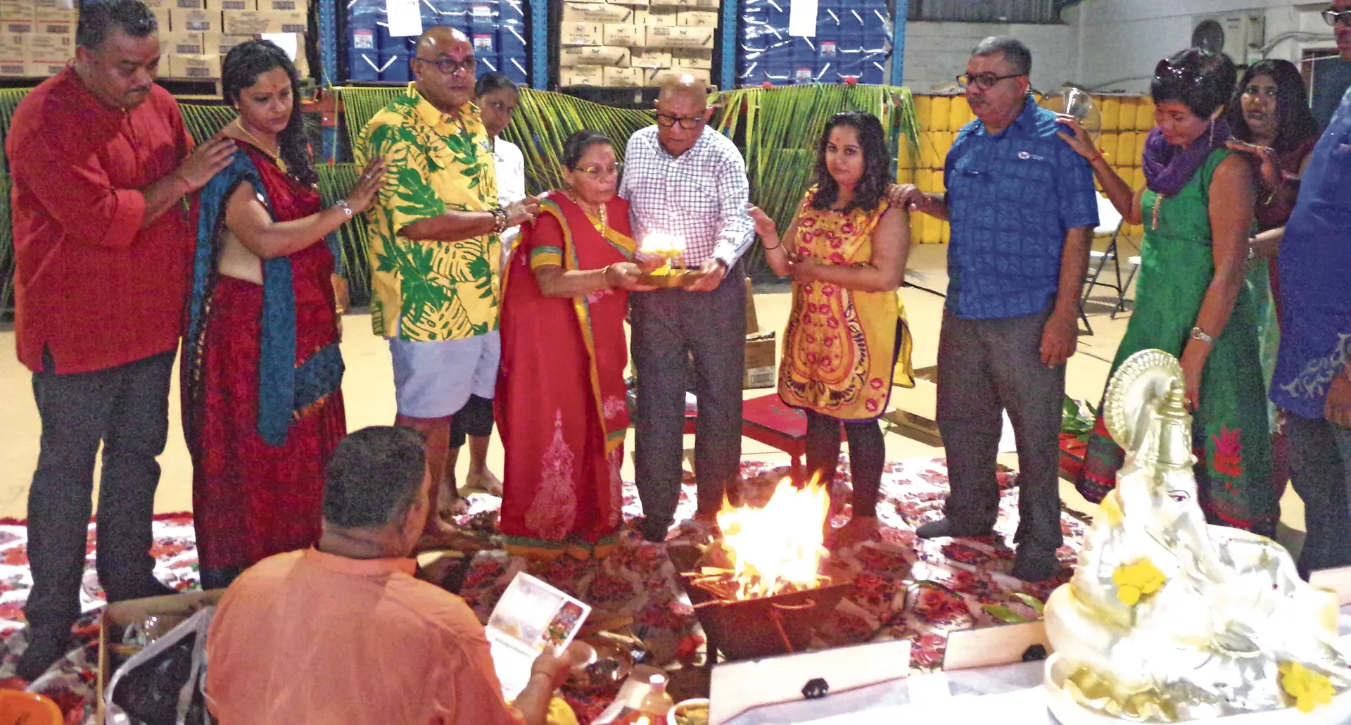 Punja family during the thanksgiving pooja at their newly renovated warehouse in Lautoka yesterday . Photo: Charles Chambers.