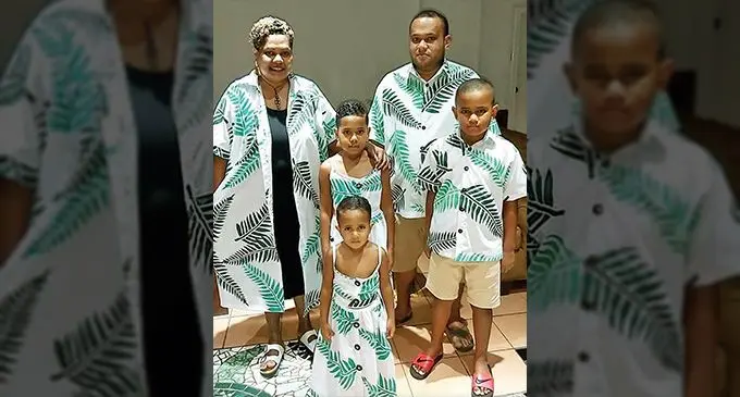 Katalaina Kuilamu with her family wearing a piece she made for their Kalavata during Christmas in 2021.