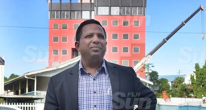 The former Fijian Holdings Limited (FHL) group chief executive officer, Nouzab Fareed outside the Fiji Sun office in Gorrie Street, Suva, on December 20, 2019, after handing in his resignation letter. The FHL building looms in the background. Photo: Ronald Kumar