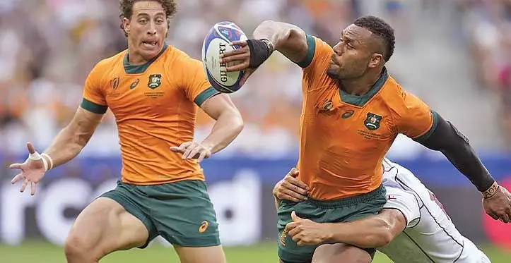 Samu Kerevi (R) offloads against Georgia during their Rugby World Cup opener at the Stade de France in Paris on September 9, 2023. Photo: rugby.com.au