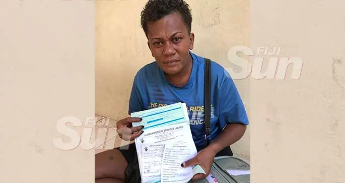 Sofia Kayaga showing the documents she will take to a lawyer in Labasa. Photo: Shratika Naidu