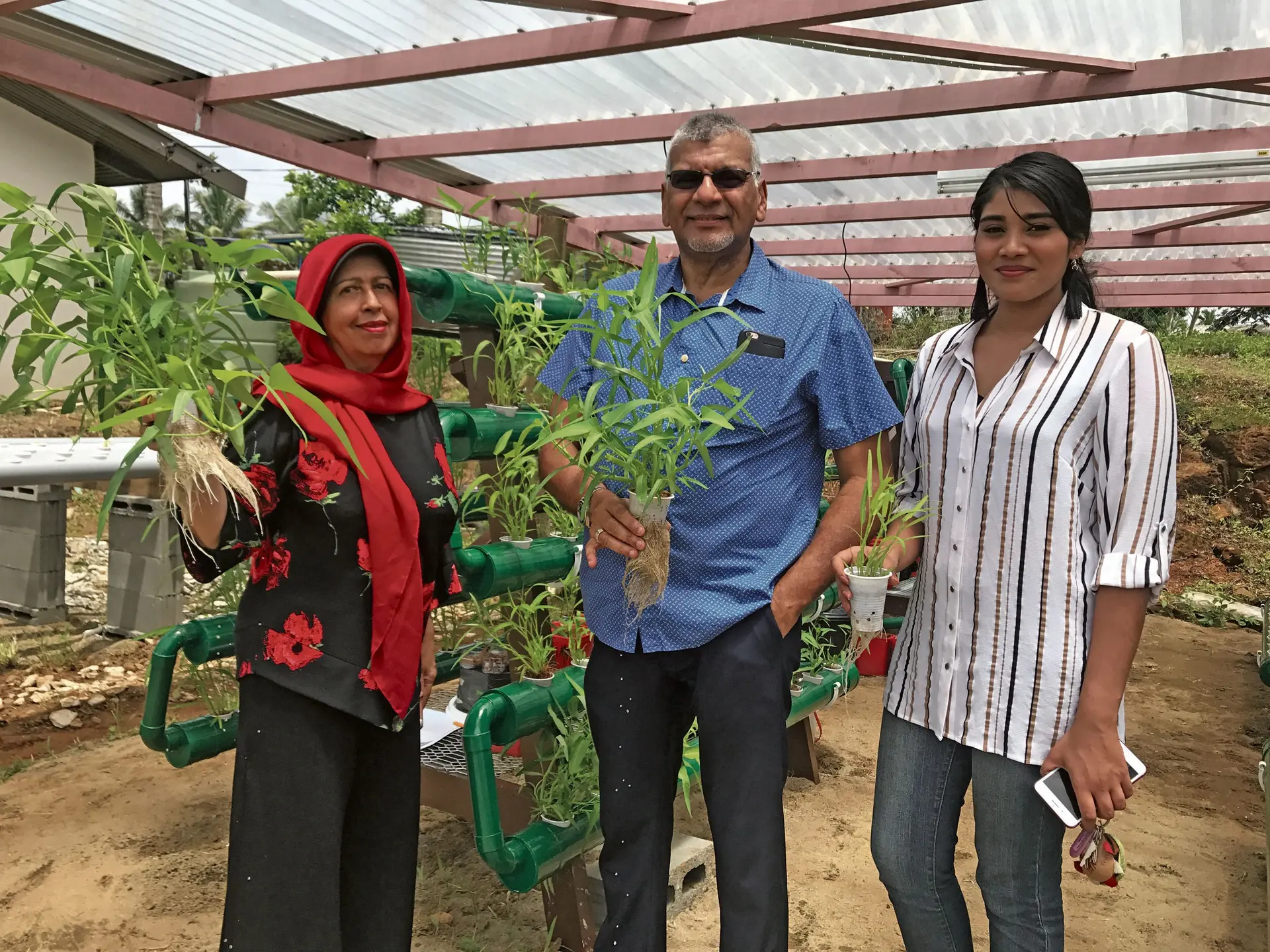 TOP: Hydroponics course teacher Jackie Ambador (left), Fiji Muslim League national president Hafizud Dean Khan with manager at the Makoi Women’s Vocational Training Centre Shazna Khan. Photo: Selita Bolanavanua