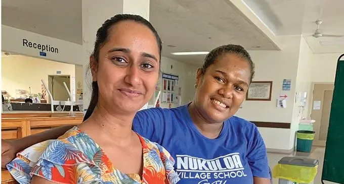 Dr Ashnita Prasad at the Colonial War Memorial Hospital in Suva on December 20, 2021, with Joana Moce, mother of the baby that was delivered on a fibreglass boat in Qarani Village, Gau. Photo: Inoke Rabonu. 
