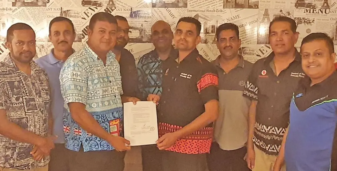 Fiji Rice Limited general manager Ashrit Pratap (third from the left), Vodafone Festival of the Friendly North president Rajneel Maharaj (sixth from left) with staff members of Fiji Rice and Vodafone Fiji after the signing of the Memorandum of Understanding in Labasa on December 3, 2020