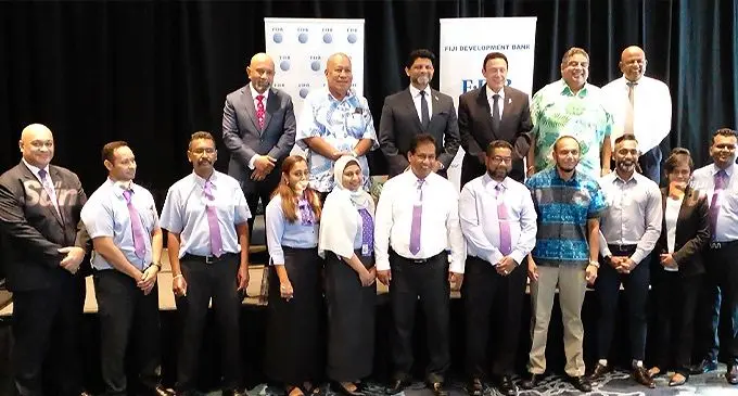 Acting Prime Minister and Attorney-General Aiyaz Sayed-Khaiyum (backrow, third from left) during the launch of Fiji Development Bank’s Small Medium Enterprises Sustainability package in Nadi. Photo: Salote Qalubau