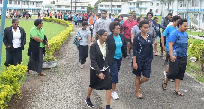 Police officers together with Civil Servants and FIRCA employees during the tsunami drill from Nasese to the assembly area at Berkley Crescent on September 25, 2018. Photo: Ronald Kumar