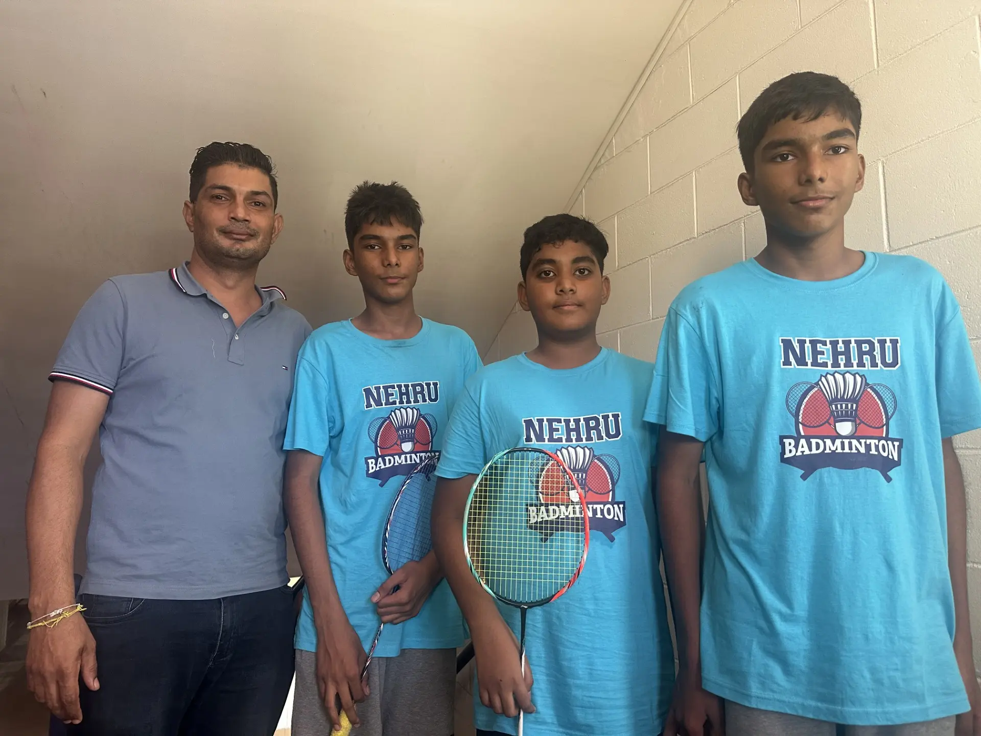 From left: Nehru Primary School team manager Avinesh Chand and his players during the Badminton Fiji Schools tournament at the FMF Gym, Suva, on May 28, 2026. Photo: Ioane Asioli