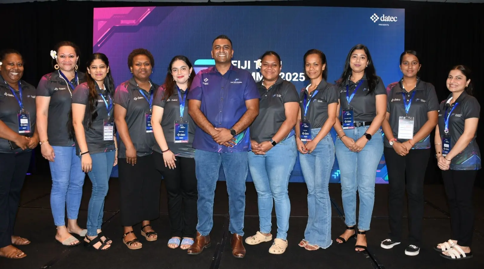 Datec Fiji chief executive officer Vinit Nand with his staff during the Fiji Tech Summit 2025 held at InterContinental Fiji Golf Resort in Natadola.