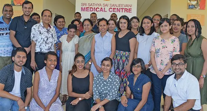 Indian High Commissioner to Fiji Padmaja and Mahendra Tappoo with volunteers at the Sri Sathya Sai Sanjeevani Medical Centre as they hosted residents of the Father Law Home for a medical check and lunch on May 25, 2019. Photo: Ronald Kumar