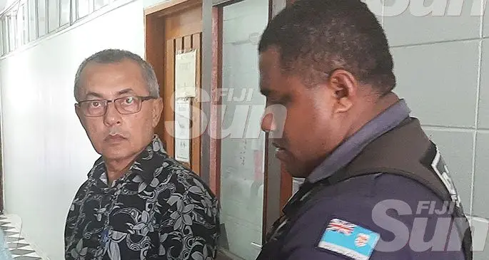 Mohammed Raheesh Isoof is escorted out of the High court in Lautoka on October 25, 2019. Photo: Salote Qalubau 