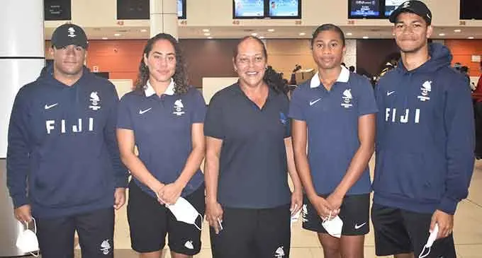 Team Fiji swimmers to the Birmingham Commonwealth Games before departing Nadi on July 21, 2022. From left: Temafa Yalimaiwai, Rosemarie Rova, coach Rosemary Rova, Kelera Mudunasoko, and Hansel McCaig. Photo: Waisea Nasokia.