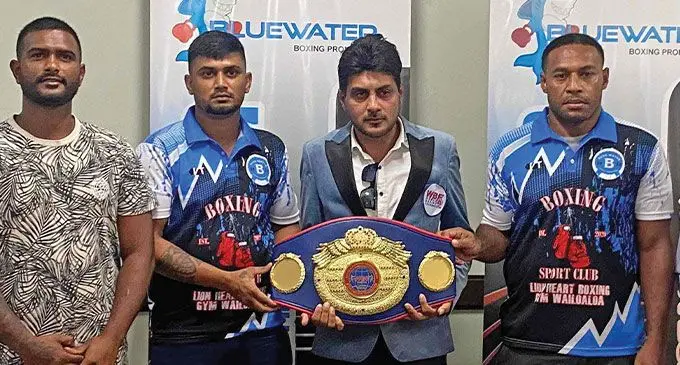 From left: Sebastian Singh with Bluewater promoter Samir Khan, World Boxing Foundation Asia Pacific representative Simon Naushad (holding the title) and Savenaca Naliva in Nadi.