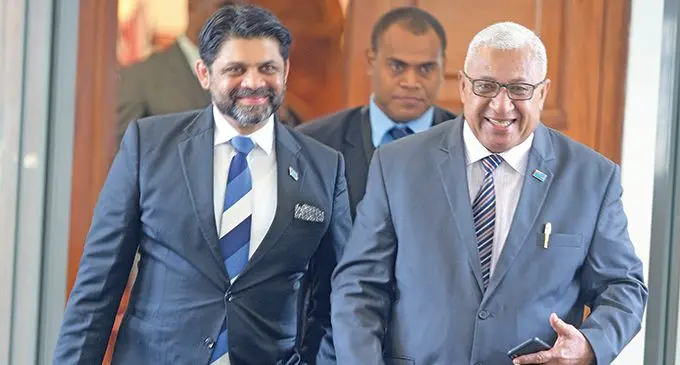 Minister for Economy and Attorney-General Aiyaz Sayed-Khaiyum (left) with Prime Minister Voreqe Bainimarama outside Parliament on June 19, 2019. Photo: Ronald Kumar