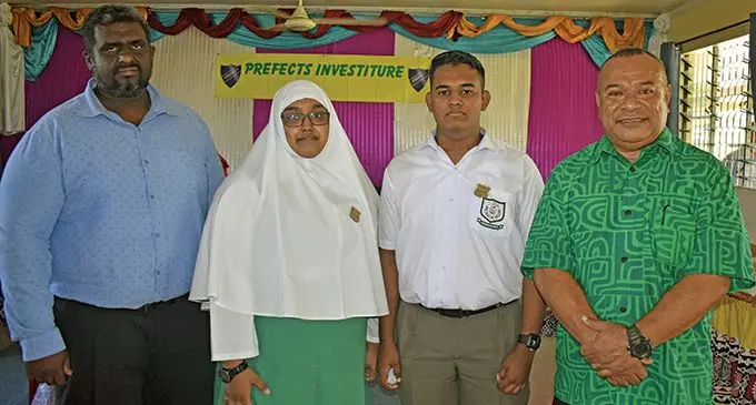 School Principal, Sheron Haroon, head girl Aaeza Azeeza, head boy, Mohammad Azhar Khan and Fiji Airports acting chief executive officer, Isei Tudreu at the Nadi Muslim College in Nadi. Photo: Mereleki Nai