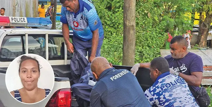 The body of Miriama Radinikuva, 37, (pictured inset) who died in the blaze is being loaded onto a Police vehicle. Photo: Sosiveta Korobiau