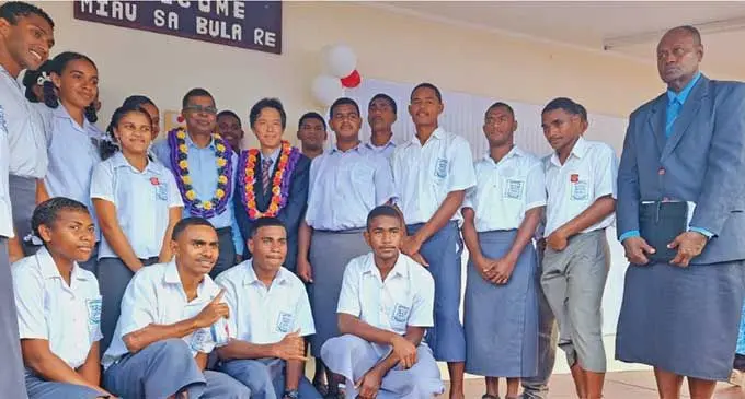 Deputy Prime Minister Biman Prasad with Japan's Ambassador to Fiji, Michii Rokuichiro and students of Dreketi Central College in Macuata on September 13, 2024.