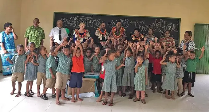 New Zealand High Commissioner to Fiji Charlotte Darlow (back, fourth from left) during the opening of Holy Cross Primary School’s kindergarten, accompanied by students, teachers, parents and guests in Wairiki, Taveuni on May 26, 2022. Photo: New Zealand High Commission