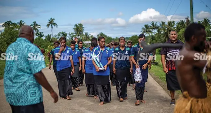 LeweniRooster Chicken Fijiana captain Bitila Tawake (holding Super W trophy), with her team mates at Navuso Village, Naitasiri, on May 27, 2022. Photo: Leon Lord