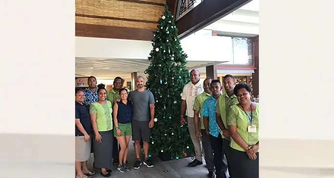 Staff and guests at the Fiji Marriott Resort Momi Bay during the Christmas tree lighting event. Photo: Waisea Nasokia
