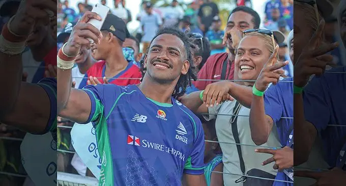 Selestino Ravutaumada takes a selfie with fans on April 1, 2023. Photo: Fijian Drua