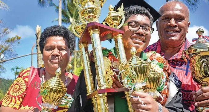 Adi Varanisese Donumanasavu with her parents during the prize giving ceremony on October 9, 2019..  Photo: Ronald Kumar