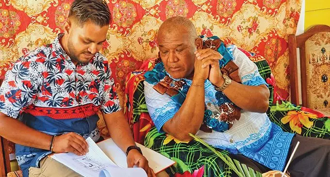 Vanua Levu Pallets and Sawmillers Limited (VLPSL) production manager and operations supervisor Vinal Pratap (left) showing the company’s community development plan to the Minister for Fisheries and Forestry, Kalaveti Ravu at Vunika, Labasa on October 20, 2023. Photo: Sampras Anand