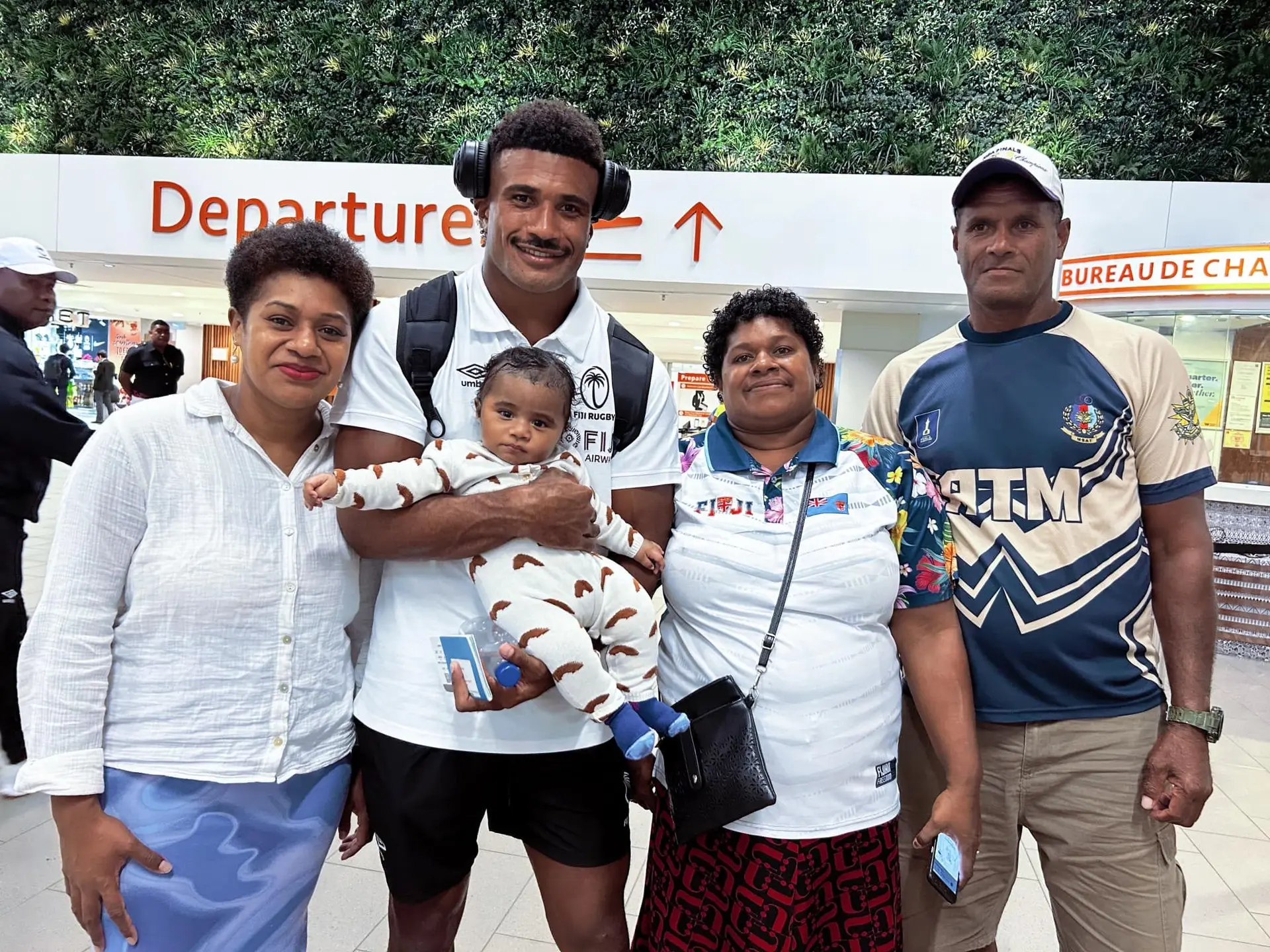 Fiji men’s rugby sevens winger Mosese Naura is farewelled by his family at Nadi International Airport on February 14, 2025. Photo: FRU Media. 
