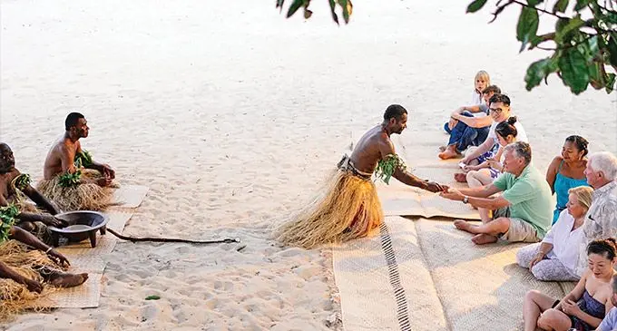 Tourists take part in a yaqona ceremony at Yasawa Island Resort and Spa. Photo: Yasawa Island Resort and Spa