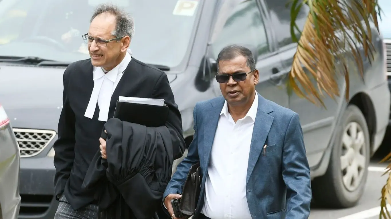 Lawyer Richard Naidu and former Deputy Prime Minister Professor Biman Prasad outside the High Court in Suva on September 21, 2026. Photo: Ronald Kumar.