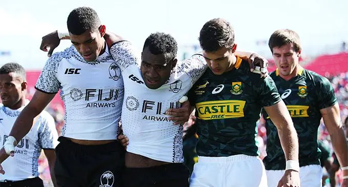 Injured halfback Semaia Tuwai (middle) is assisted off the field during the Las Vegas 7s on march 4, 2019. Photo: World Rugby