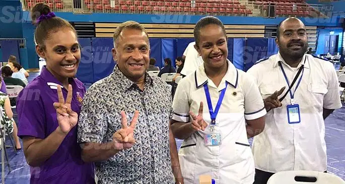 From left: Student Nurse Talei Beckmann, United Nations Resident Coordinator for Fiji and the Pacific Sanaka Samarasinha, Staff Nurse Aqela Matai and staff nurse Ilaitia Camadrokadroka during the COVID-19 vaccination drive at the Vodafone Arena in Suva on April 13, 2021. Photo: Inoke Rabonu