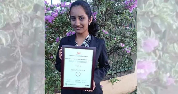 Inayah Ali showing her bronze award certificate attained after competing in the Queen’s Commonwealth Essay Competition 2021.