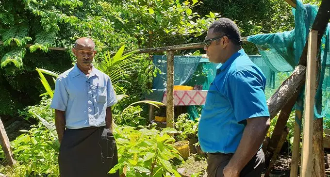 Watisoni Kunauwa with acting director central eastern Apisai Rinamalo at Nabulini Village.
