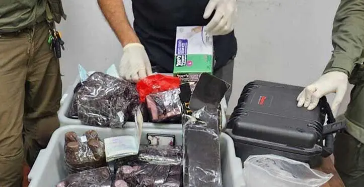 Israel Police examine UN employees kits wrongly suspected of containing liquid cocaine, that were allegedly part of an attempt to smuggle drugs into Israel from Jordan on June 25, 2023. Photo: Israel Police