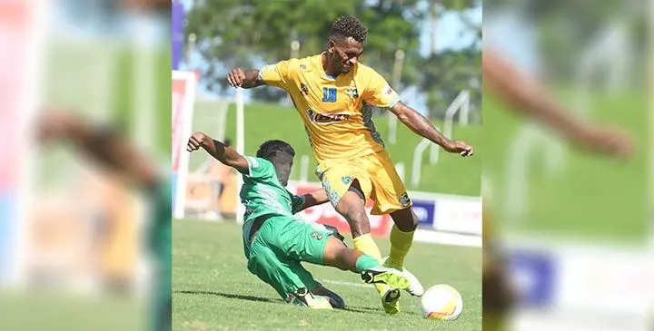 William Khan of Nadi and Siotame Kubu of Nadroga battle for possession during BiC Fiji FACT tournament at HFC Bank Stadium on May 30, 2025. Photo: Ronald Kumar