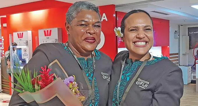 Fiji Airways cabin crew members Akesa Delai, left, and Chanel Stephen. Photo: Waisea Nasokia