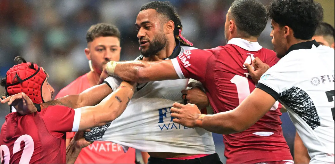 Fiji Water Flying Fijians winger Peniasi Dakuwaqa exchanges words with his Georgian counterpart. Fiji won 21-12.