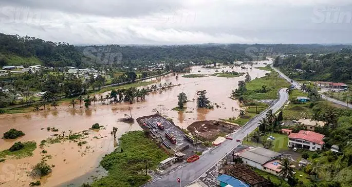 HEAVY RAIN ALERT... The Waimanu River at Sawani, Nausori, burst its banks yesterday after heavy rain on Saturday night. The Nadi weather office has predicted more rain and thunderstorms for Viti Levu, Kadavu and nearby islands, Lau and the Lomaiviti groups. Labasa and Savusavu are expected to experience a lot of rain and thunderstorm as well, with a low pressure system, associated with clouds and rain, slowly moving over Fiji. Photo: Leon Lord