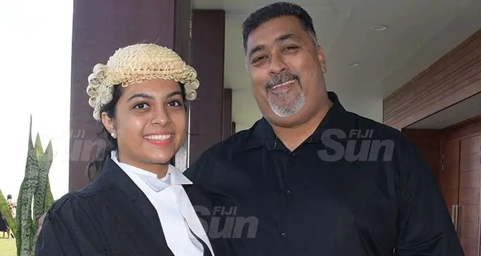Faiyaz Saheb (right) congratulates his daughter, Shahista Saheb following her admission to the Bar by Acting Chief Justice Kamal Kumar at the Grand Pacific Hotel on August 7, 2020. Photo: Ronald Kumar