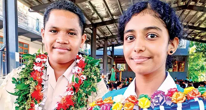 Nehru Memorial Primary School head boy Fuiono Aso and head girl Adrija Achariya following their prefects’ induction on May 5, 2022.  Photo: Ronald Kumar