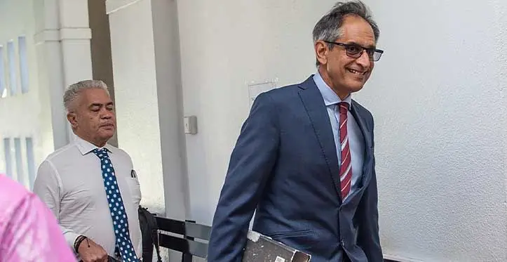 Richard Naidu (front) with his lawyer Jon Apted. Photo: Leon Lord