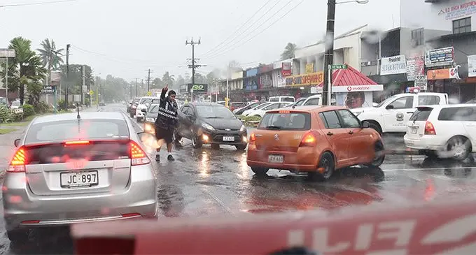 A Police officer trying to control traffic movement in Lami Town on April 10, 2018.  Photo: Ronald Kumar