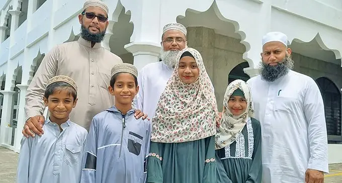 Samabula Jame Masjid Maulana Abdul Alim with Mufti Sher Khan and Mulfti Zaeem Zarib with Usaidur Rhman,Ubaidur Rahman, Raqeebah Ishrat and Mukarramah Uzhma. Photo: Laiseana Nasiga