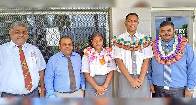 From left: All Saints Secondary School teacher Josevata Ratuvou, principal Kamlesh Prasad, head girl Miriama Watikili, head boy Mesake Cokanauto, and chief guest Rikshal Dayal in Labasa on February 21, 2025. Photo: Shratika Naidu