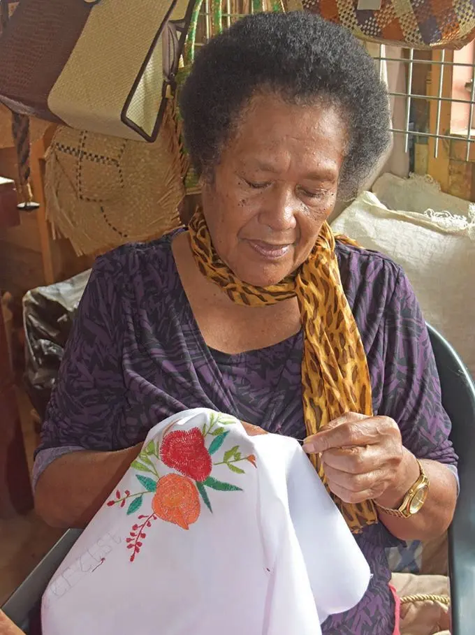 Ms Amelia Lave Waqabaca Virivirilau keeps herself busy by doing artwork on pillow cases at the Handicraft Centre in Labasa.  
